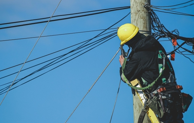 A person working in dangerous conditions